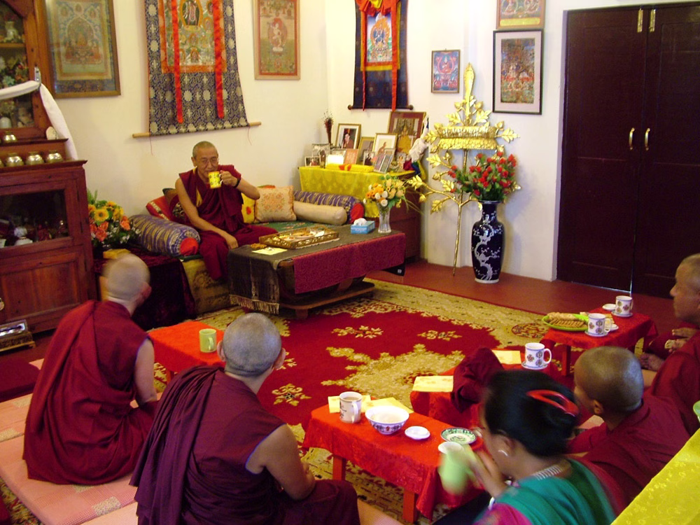 Meanwhile Khen Rinpoche Geshe Chonyi and other visitors are enjoying some tea in Lama Yeshe’s Room.