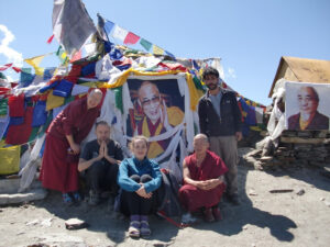 Putting up prayer flags, making light and incense offerings and many prayers.