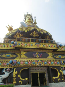The Padmasambhava statue overlooking the lake