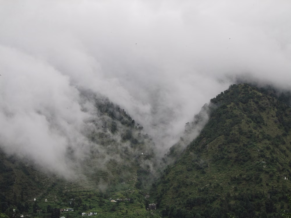 Back home to the monsoon – the fog is rolling down the hills above Dharamkot and Tushita