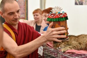 Dharma students and their pets during animal blessing with Lama Zopa Rinpoche - Ganden Tendar Ling, Moscow, Russia; Photographer: Renat Alyaudinov